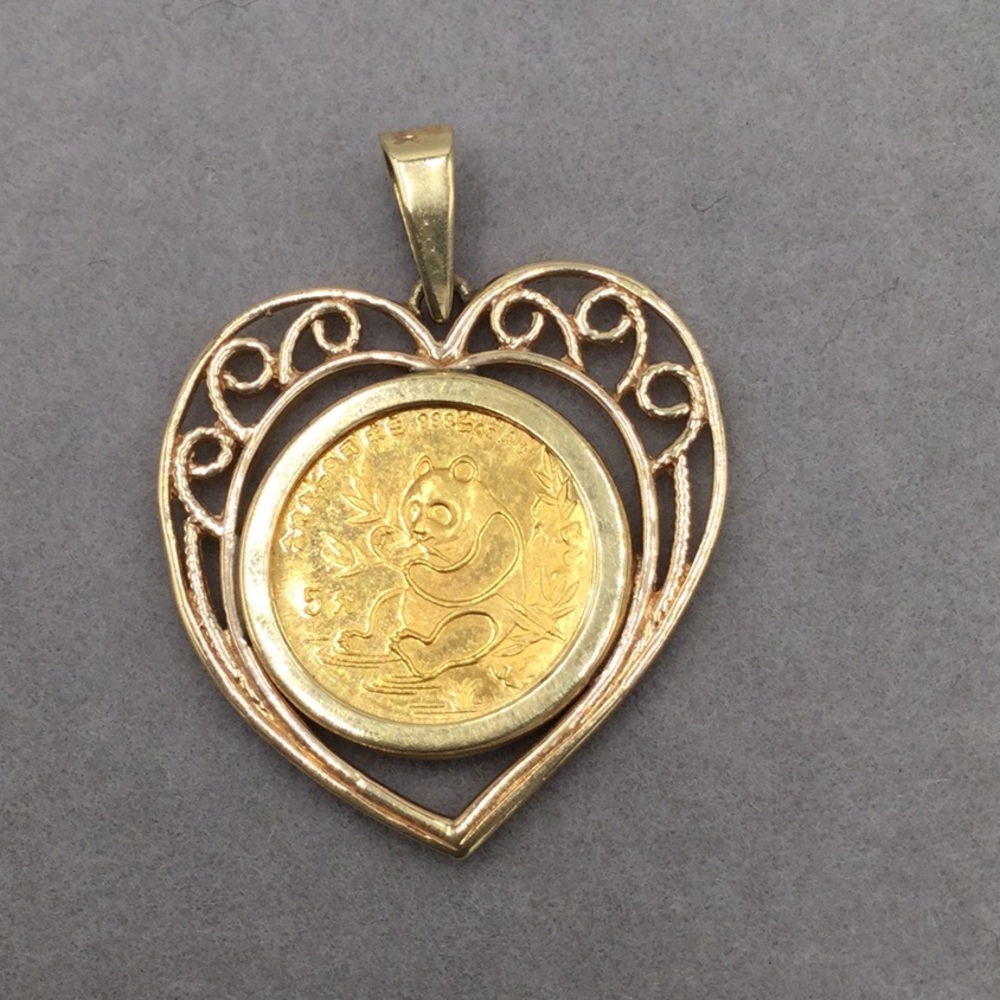 Pendant 14 karat gold with panda coin